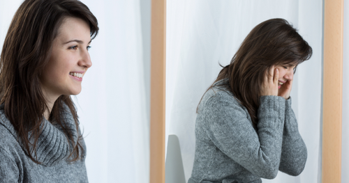 woman seeming happy but is actually sad - shopping therapy