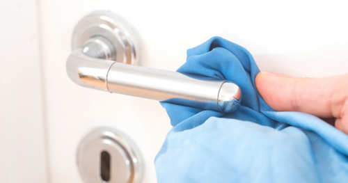 cleaning doorknob